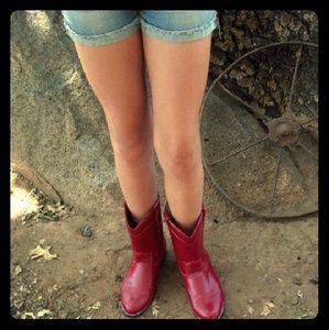 Red leather cowboy boots.