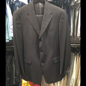Black pinstriped suit -44L