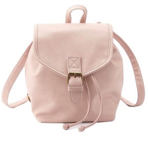Blush pink mini backpack.