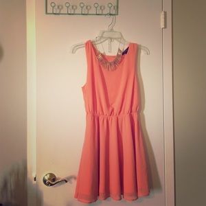 Coral open back sleeveless dress