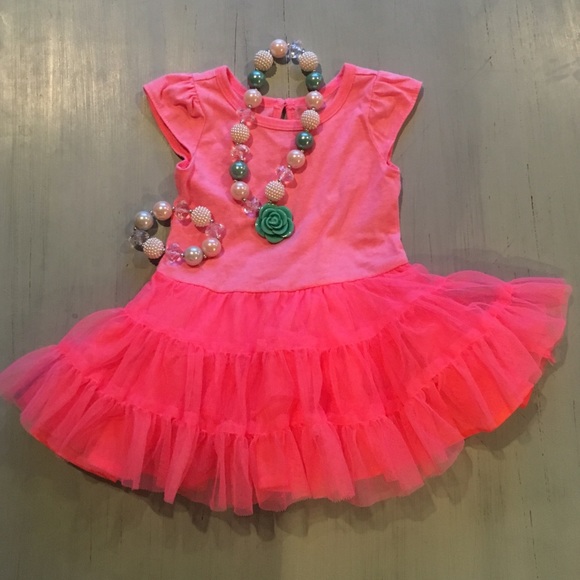 Bright coral tutu dress with indie snaps