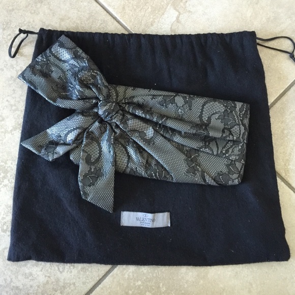 Authentic Valentino laced clutch