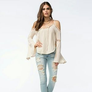 Others follow cold shoulder top