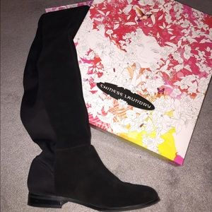 Black suede over the knee boots.