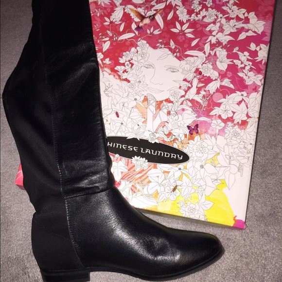 Black leather over the knee boots.