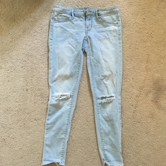 Distressed light wash jeans