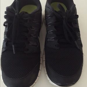 Ladies black Nike 5.0