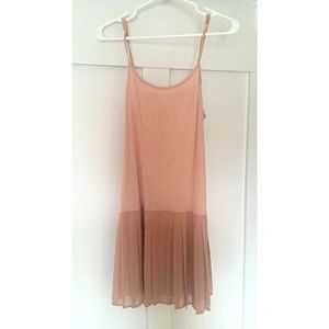 Dress with pleated skirt