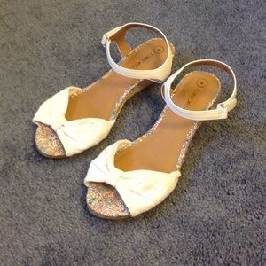 Cherokee white sandals.