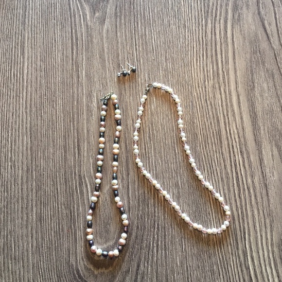 Multi colored pearl necklaces and black earrings