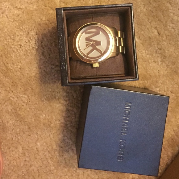 Michael Kors Women´s gold runway watch