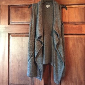 Dark gray sweater vest.