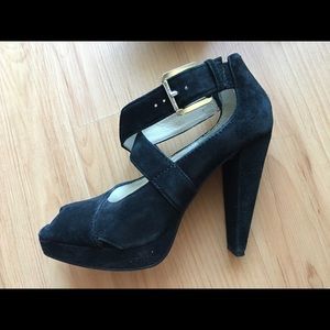 Black suede peep toe pumps