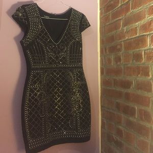 Black sequin BeBe dress.