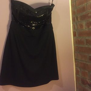 Black strapless dress.