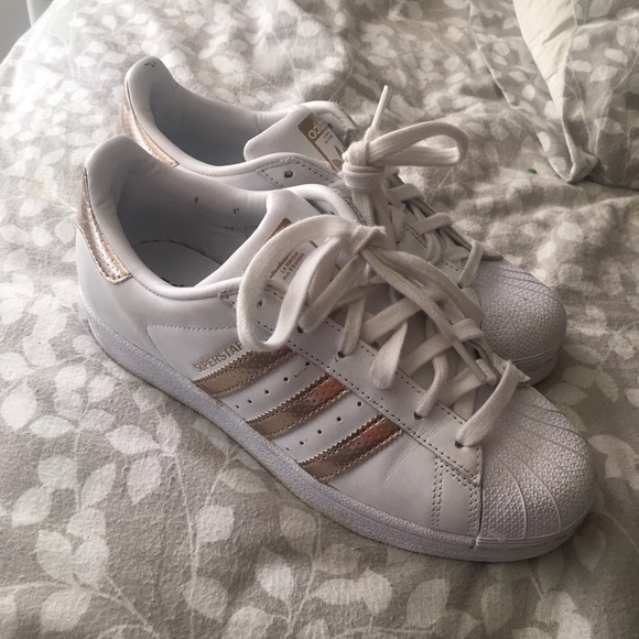 Gold adidas superstars