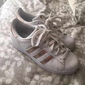 Gold adidas superstars