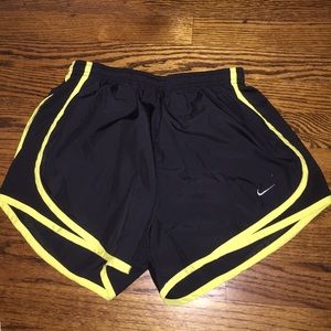 Black/yellow Nike shorts
