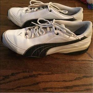 White and navy Puma's