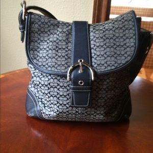 Coach signature bag.