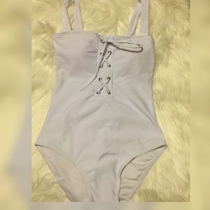 Bodysuit  color white brand new!!!!