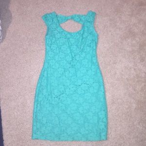 skin tight turquoise dress