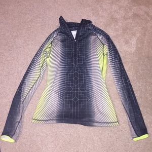 black white and neon green Nike quarter zip