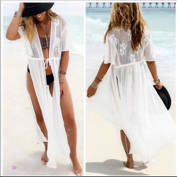 Beautiful long open side lace bikini cover up.