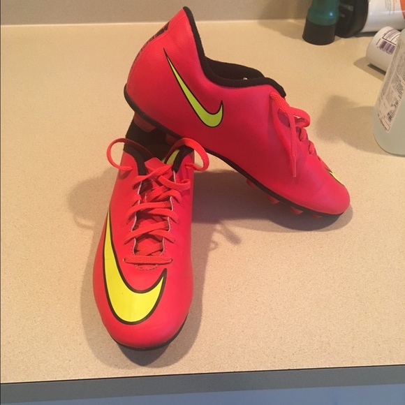 Pink and yellow Nike cleats