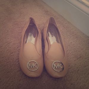 Michael Kors tan quilted leather flats