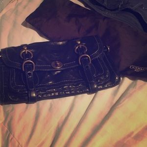 Coach black leather clutch $348