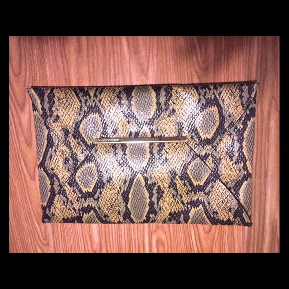 BCBG snake skin design clutch, super hot!