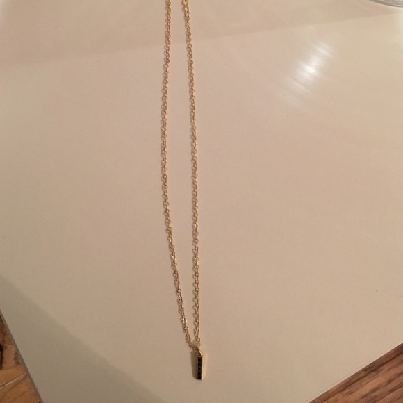 Everyday gold necklace with black stones