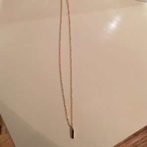 Everyday gold necklace with black stones