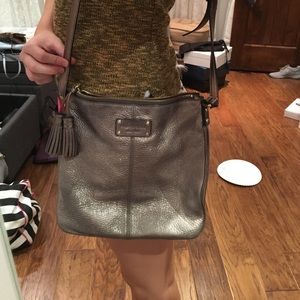 Kate spade cross body bag silver.