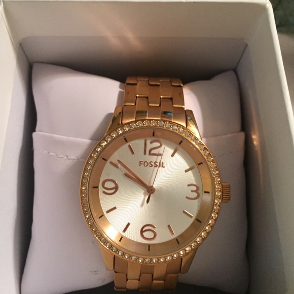 Gold fossil watch