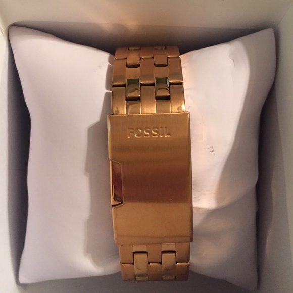 Gold fossil watch