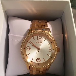Gold fossil watch