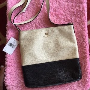 Kate spade black and cream cross body.
