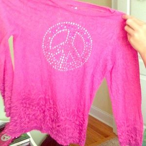 A cute kids pink long sleeve shirt