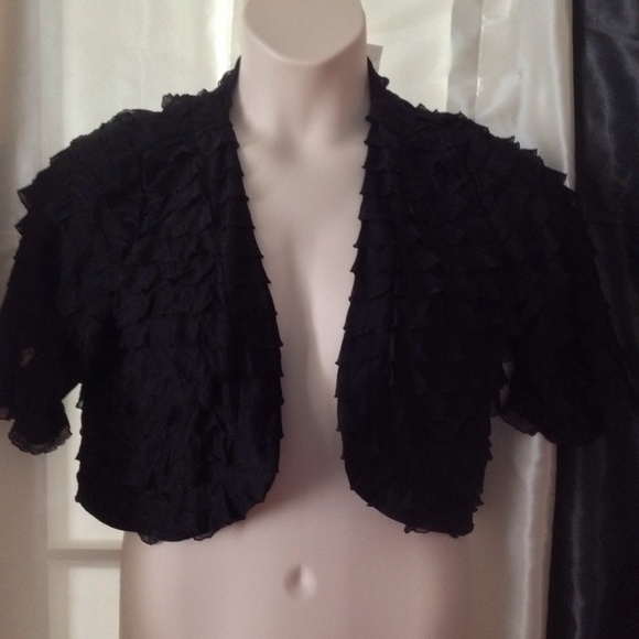 Black ruffled shrug.