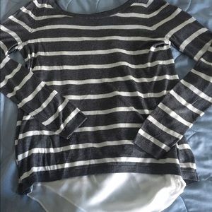 Crew neck sweater with chiffon open back.