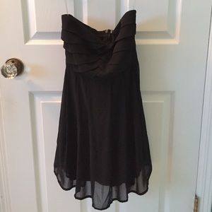 Mini black dress.