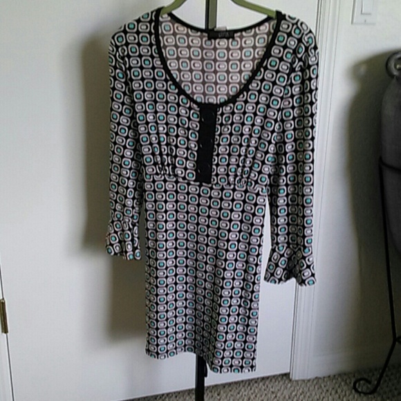Like New tie back. Fits like xl