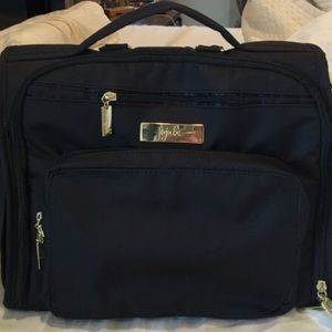 Black and gold juju be diaper bag.