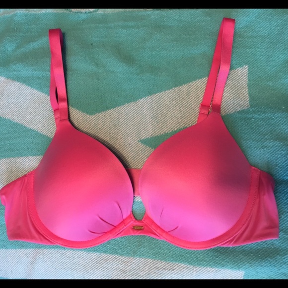 Gently worn bright pink plunge push up bra