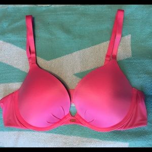 Gently worn bright pink plunge push up bra