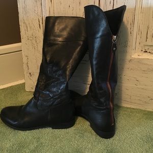 Tall black boots
