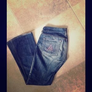 Boot cut Seven Jeans with pink pocket stitching