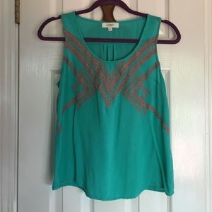 Teal tank top with coral embroidery